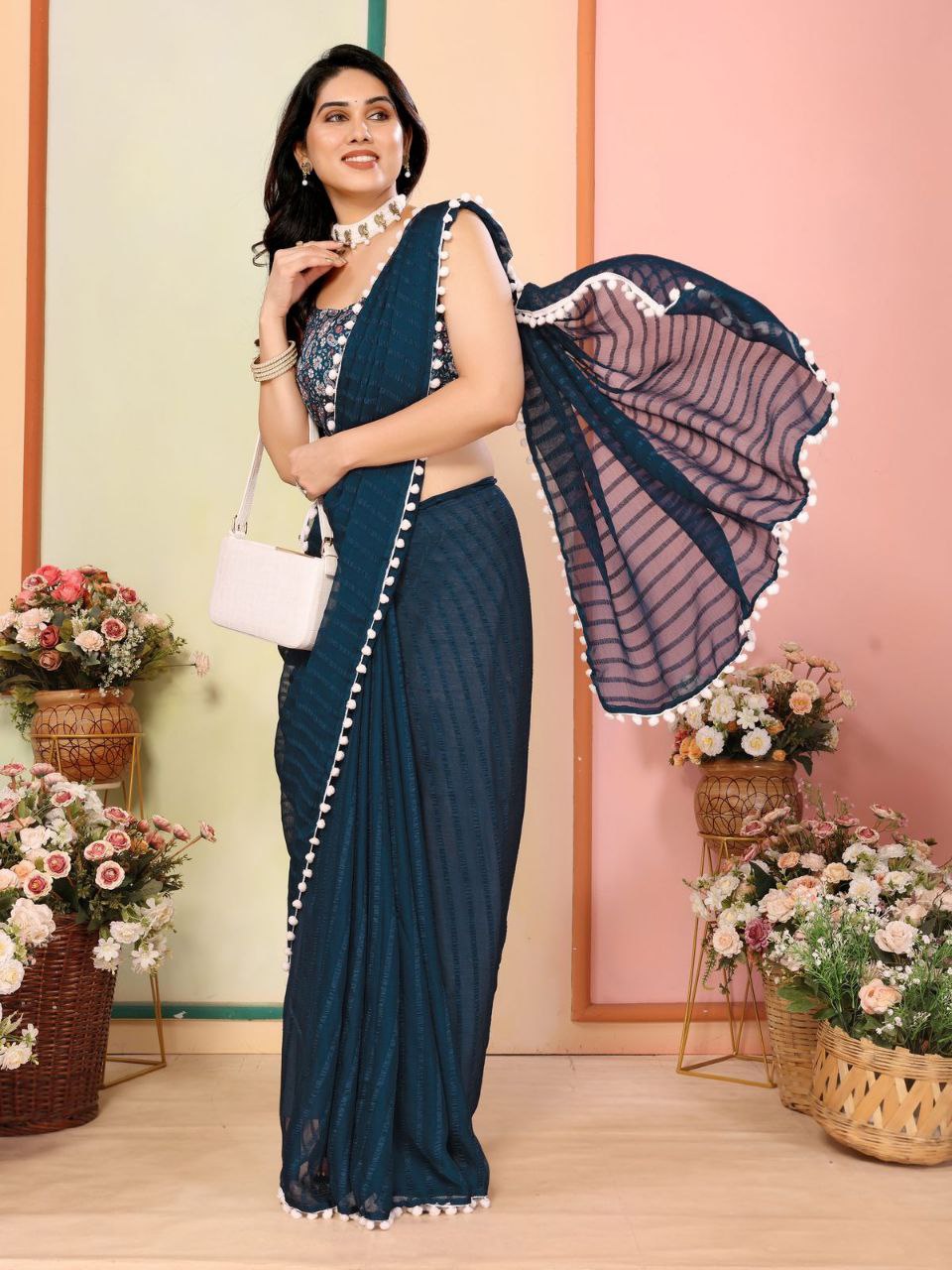 Teal Stylish Plain Georgette Saree